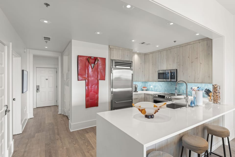 Newly remodeled kitchen with SubZero refrigerator and induction range.