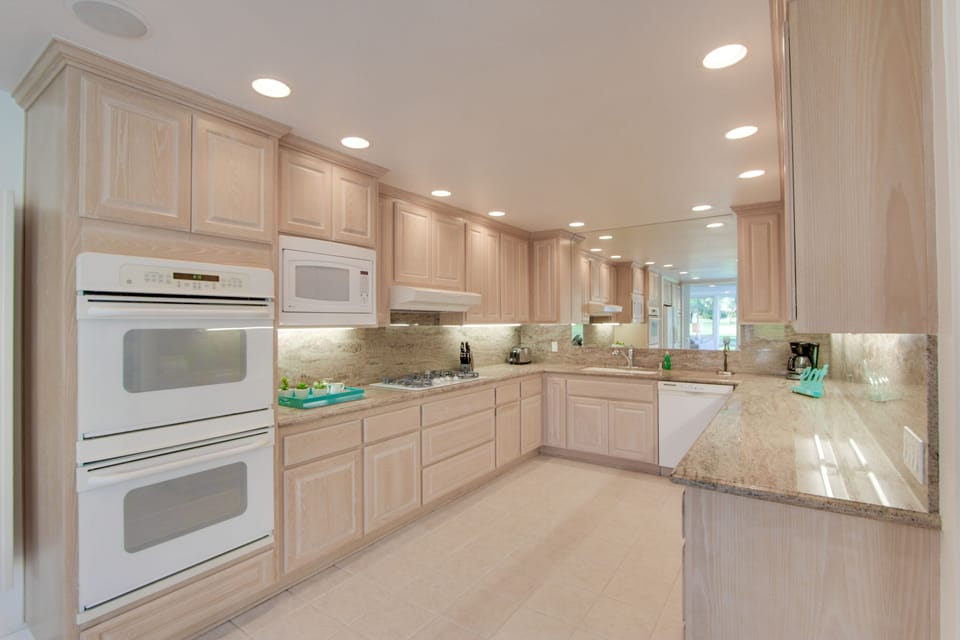 Large open kitchen has plenty of counter and cabinet space 
