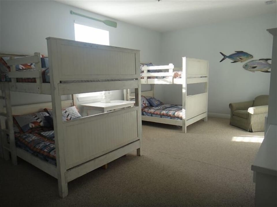 Bedroom Six/ Large bunkroom with four double beds,private bathroom,TV/DVD