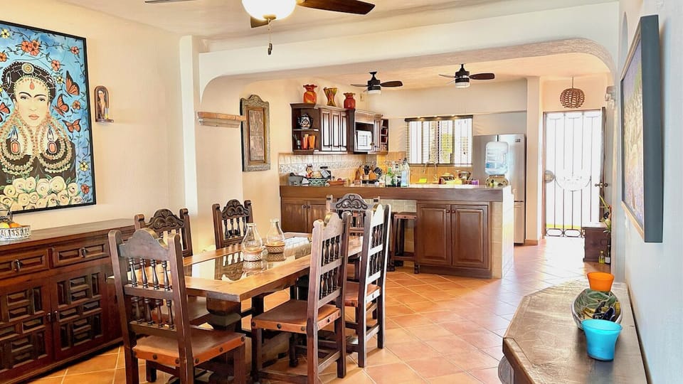 Dining area opens to kitchen and living room