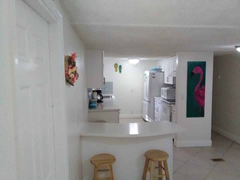 Kitchen and adjacent Dining room seat 10. Fridge, oven, Microwave,coffee maker