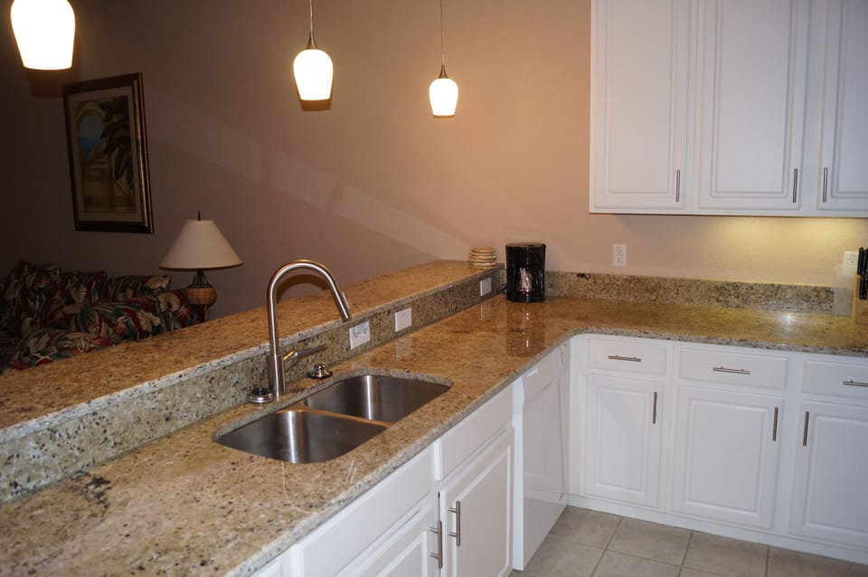 New lights, granite countertops, stainless steel sink and taps.