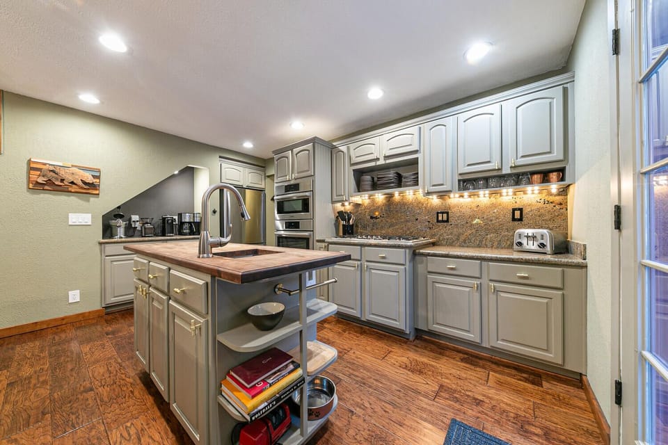 Coffee nook and new (2025) refrigerator w/icemaker on far wall. 
