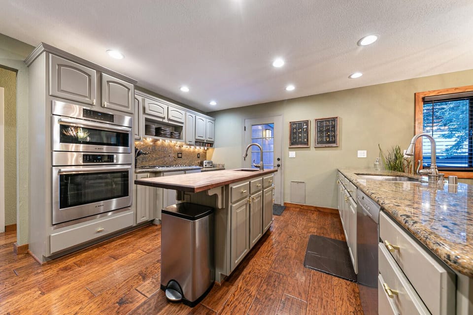 Open concept floor plan keeps the chef in on family fun.