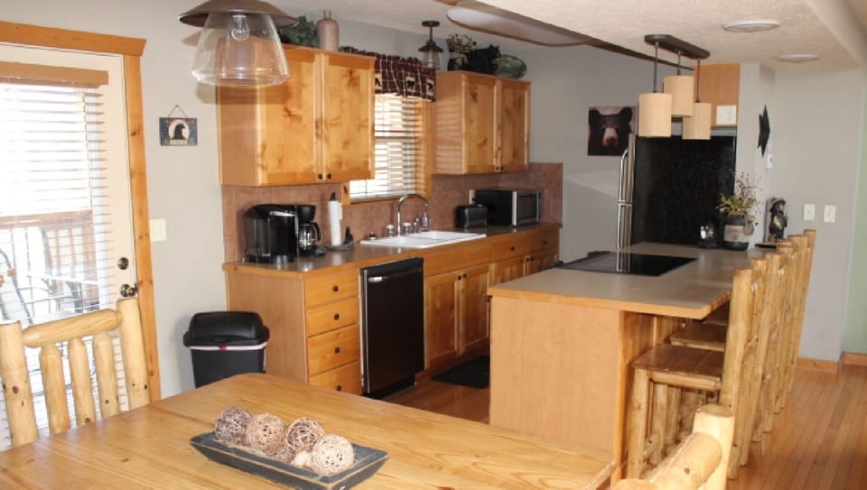 Brand new stainless appliances and a fully stocked kitchen for preparing meals!