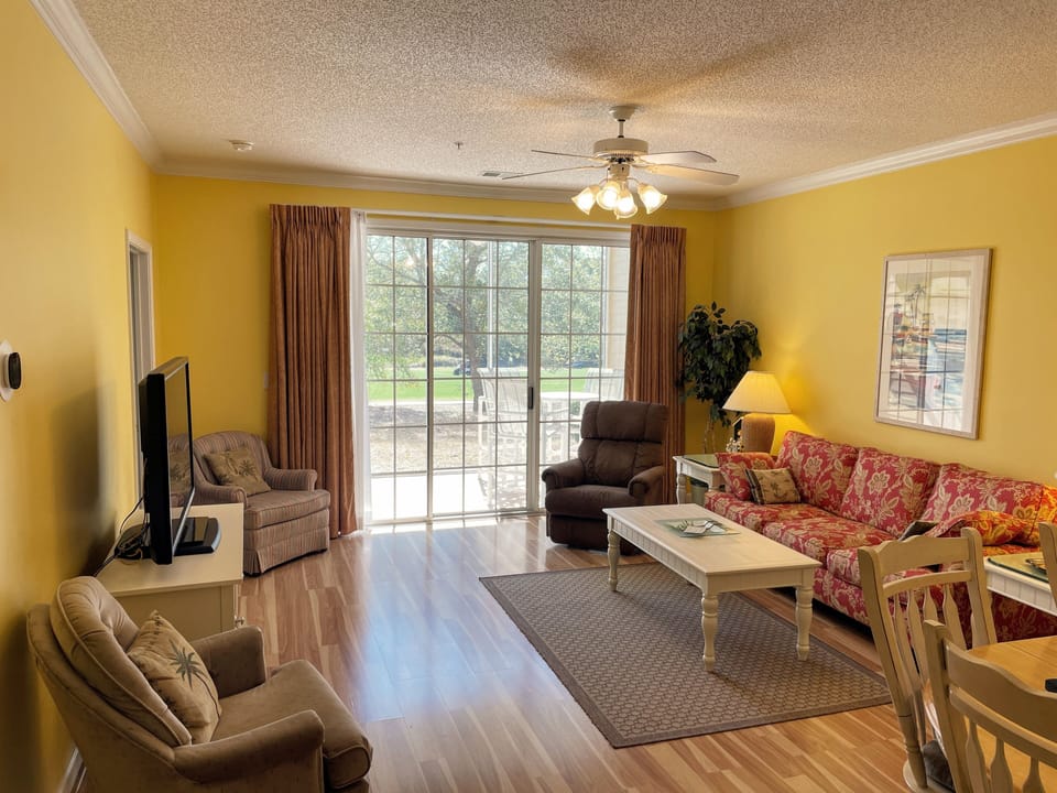 Dining/Living Room:  Tons of Natural Light, New Sofa Bed, Comfy Recliner!