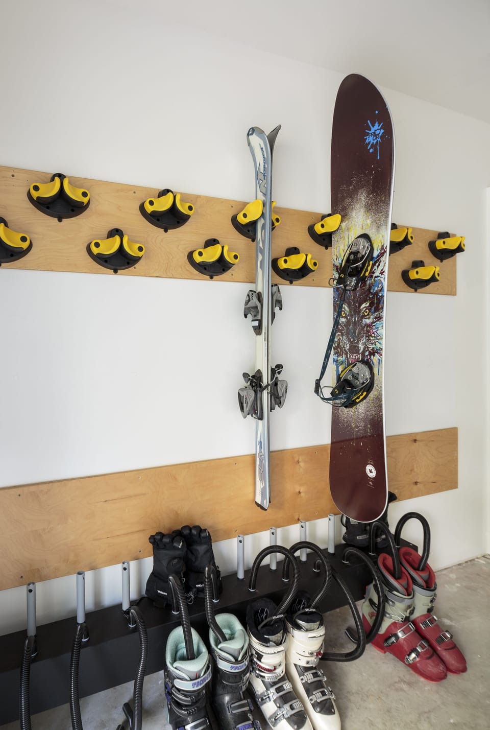 Ski/Snowboard Storage along with  boot and glove dryer in heated Garage.