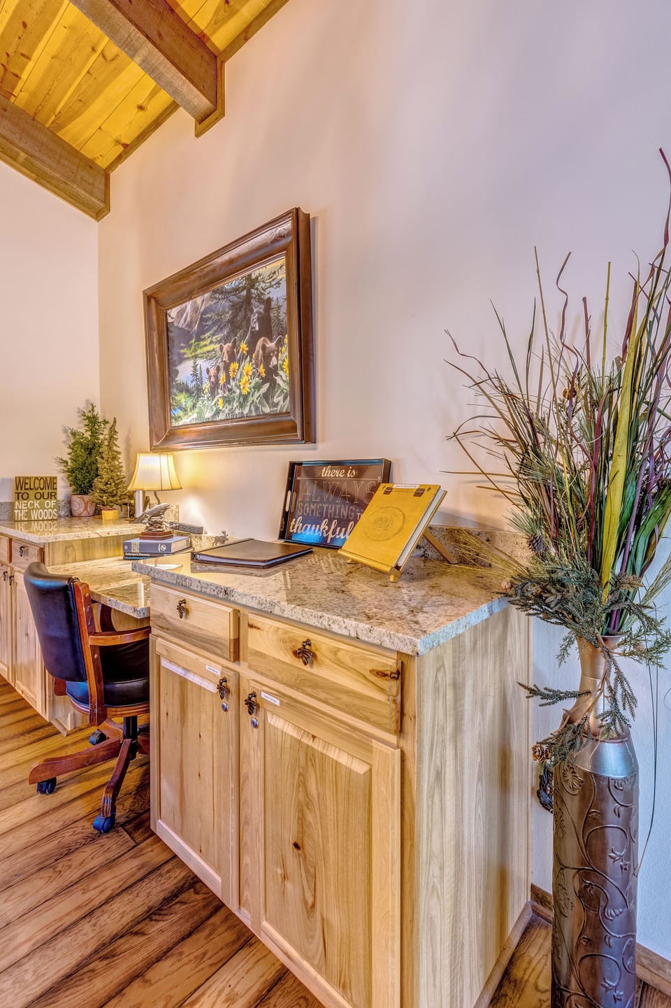 Office area, adjacent to dining room table.   Rolling leather chair provided.  