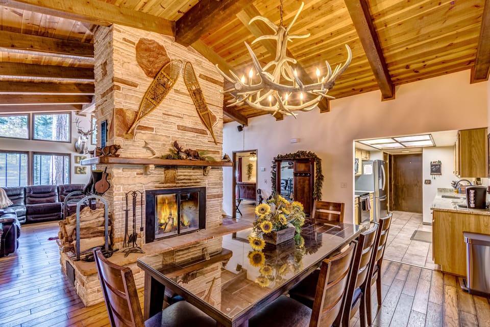 Dining Room with views of the double sided fireplace.