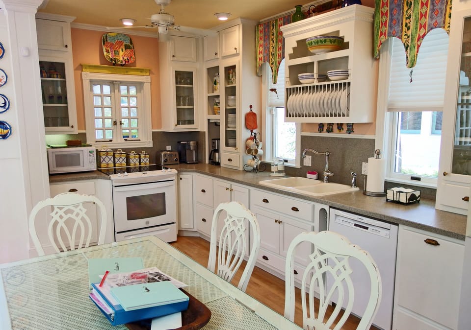 Nicely stocked Kitchen including both K cup machine and drip coffee pot.