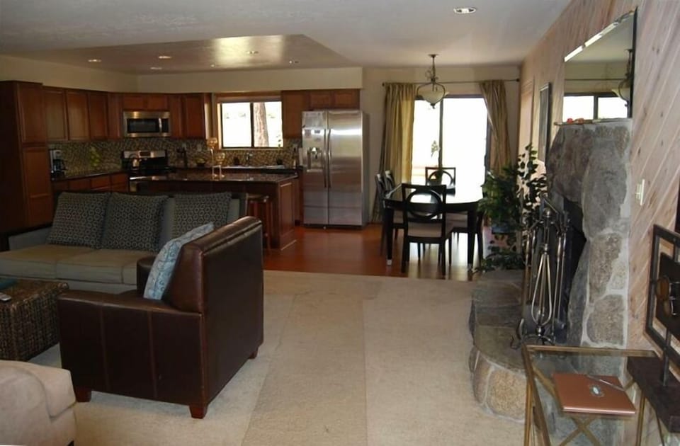 Kitchen table with seating for 8 and Natrual Fireplace