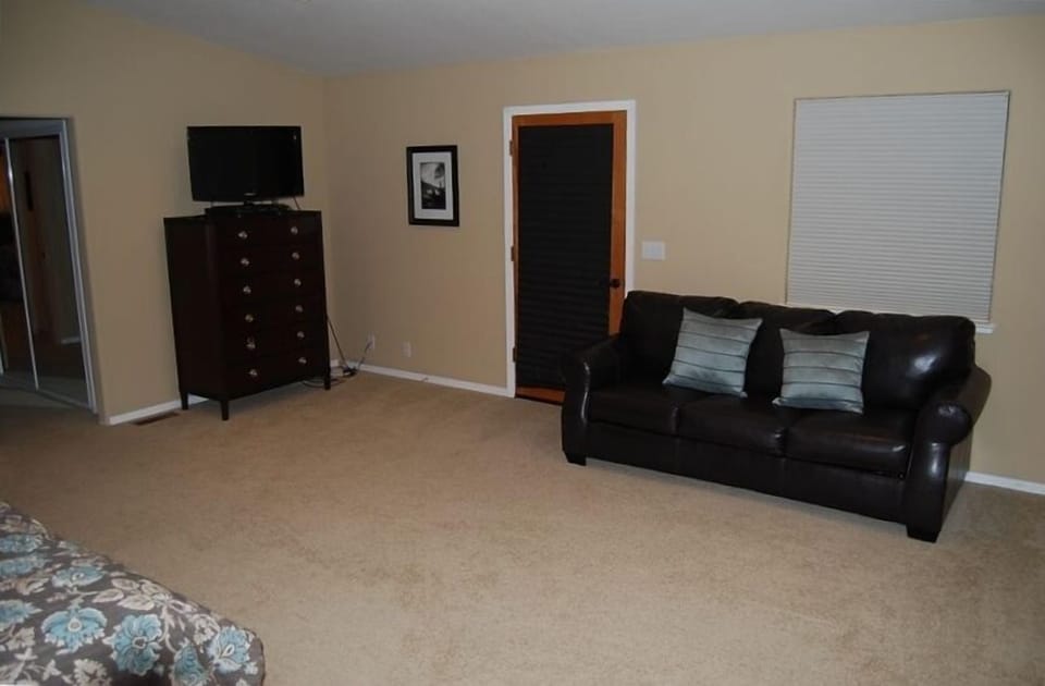 Master Bedroom with Flat Panel TV, DVD player and Queen size Sofa Bed