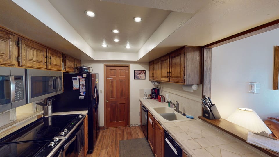 Full Kitchen w/Full Refrigerator Dishwasher Dual Stove Tops Ovens & Microwaves