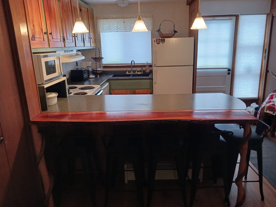 Kitchen with view of front door.