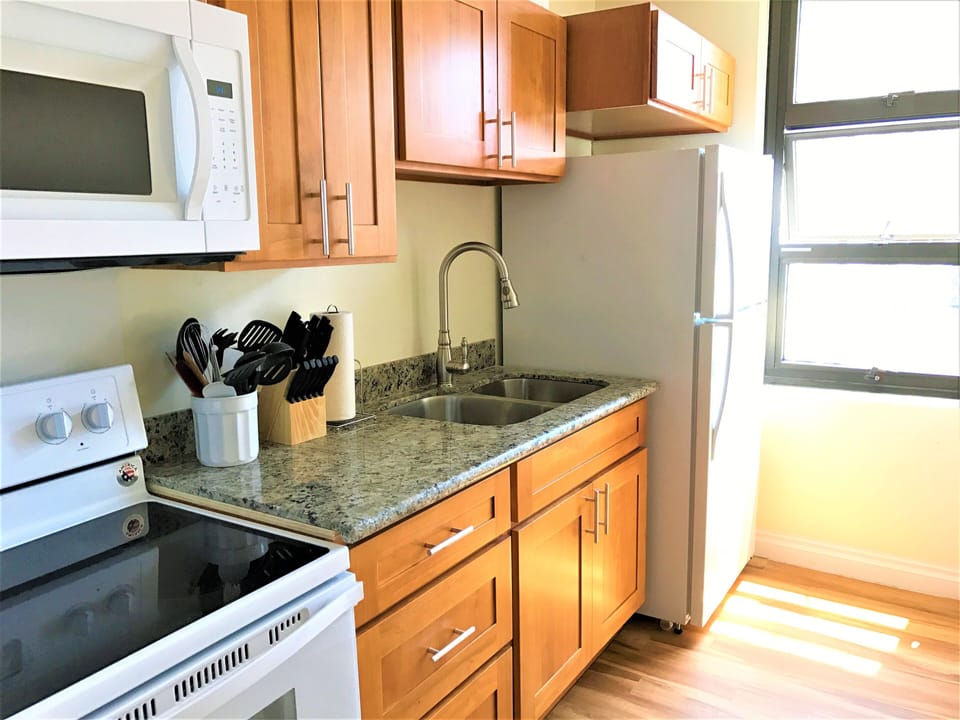 Kitchen- fridge, oven, stove, microwave, pots/pans, dishes and small appliances