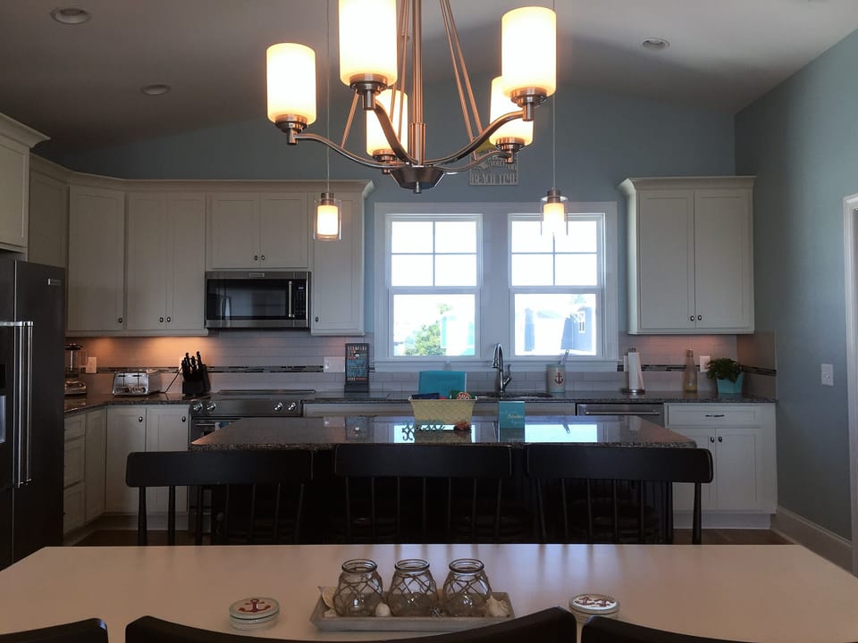 Gourmet kitchen with all amenities, upgraded stainless and granite countertops. 