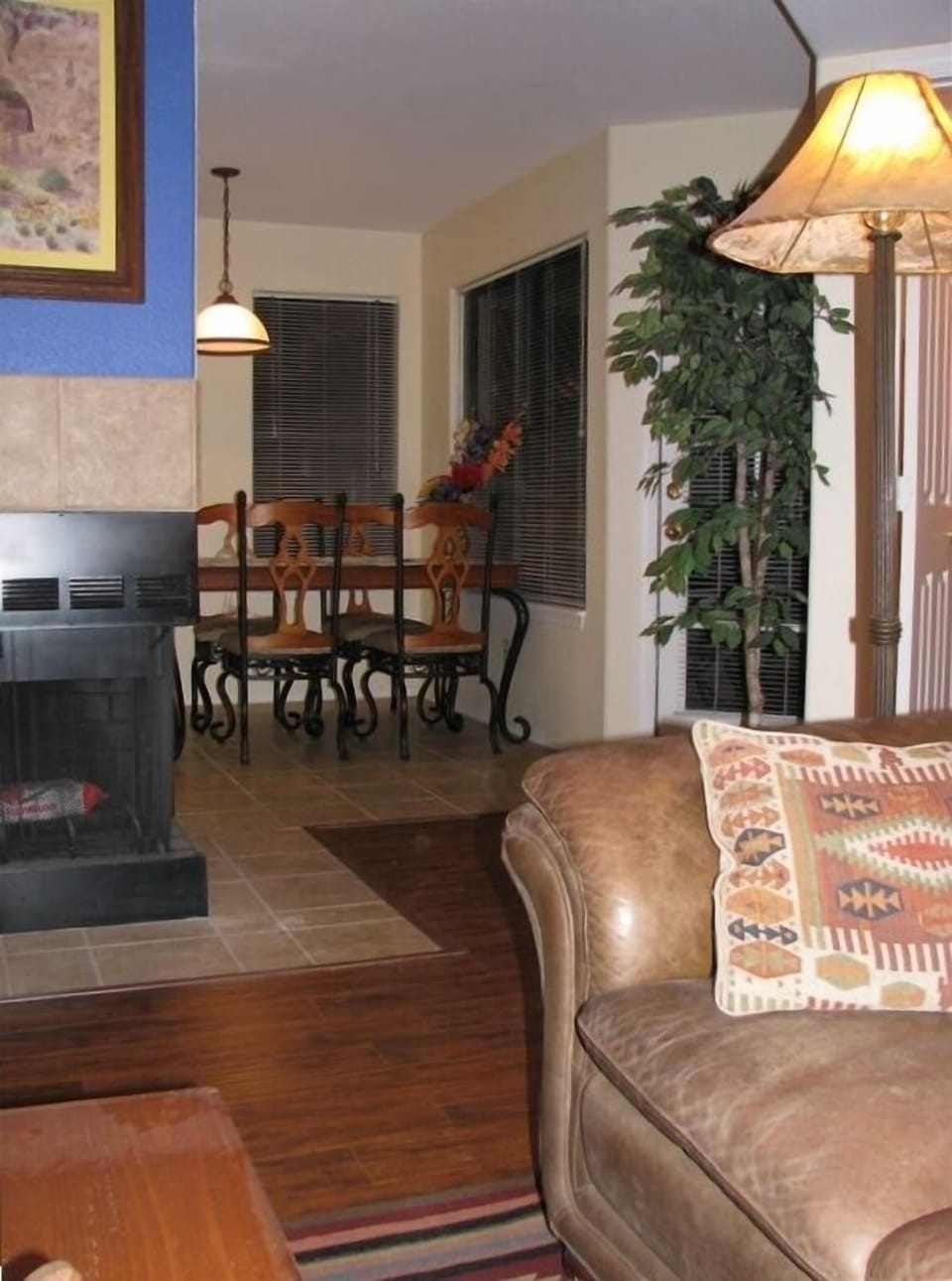 Relax in the saddle leather sofa, easy chair; enjoy the fireplace & 27" TV/DVD