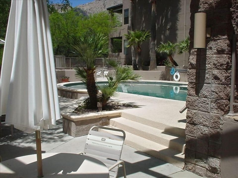 Relax with poolside mountain views