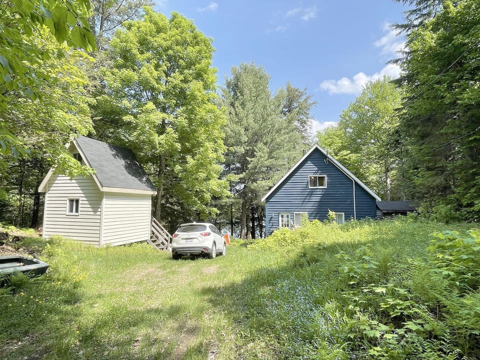 Road-side view of main cottage and bunkie