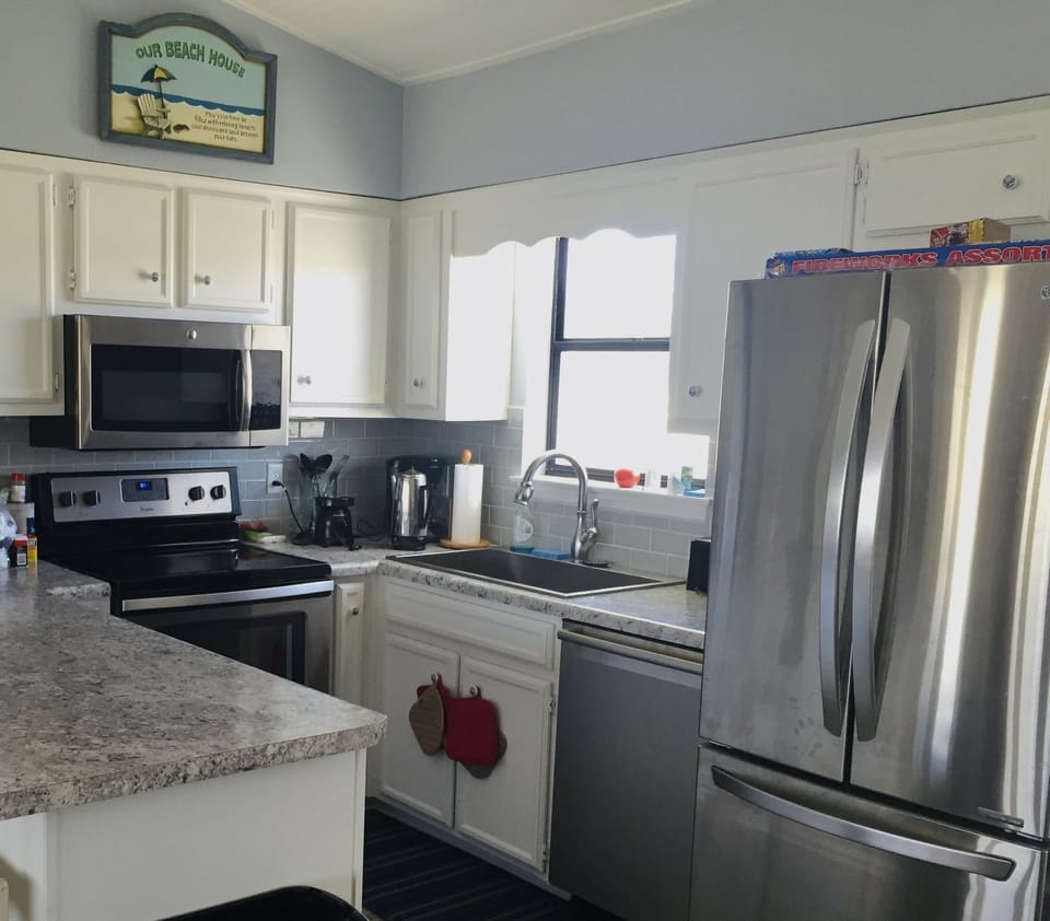 Microwave, Range w/oven, deep stainless steel sink, dishwasher, etc 