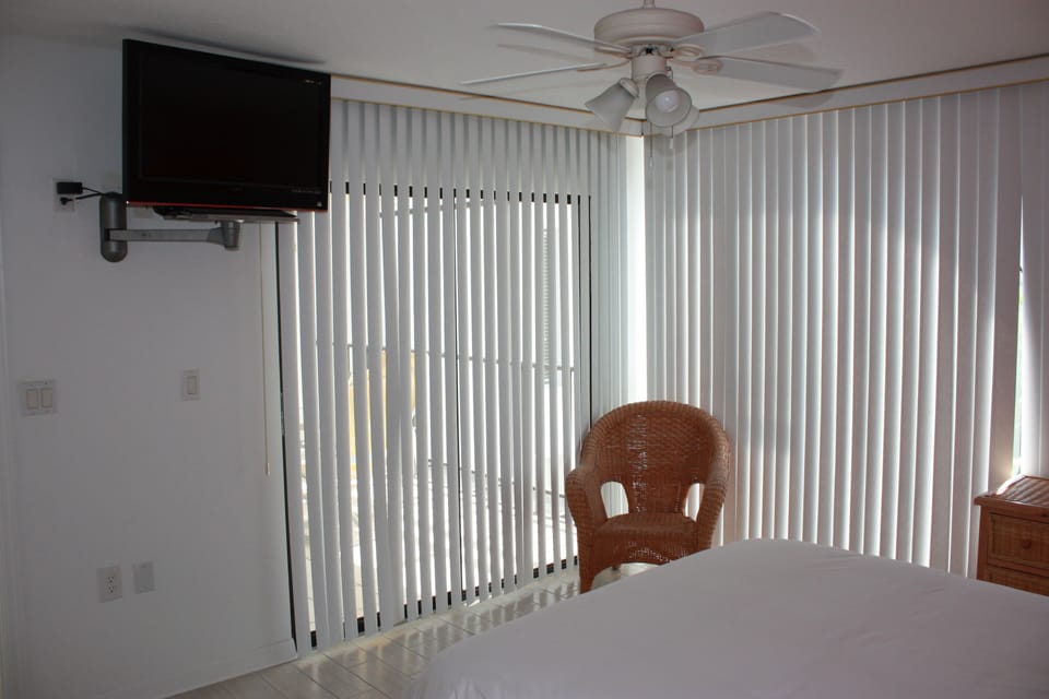 master bedroom opens to the lanai - view of the gulf, west facing = soft am lite