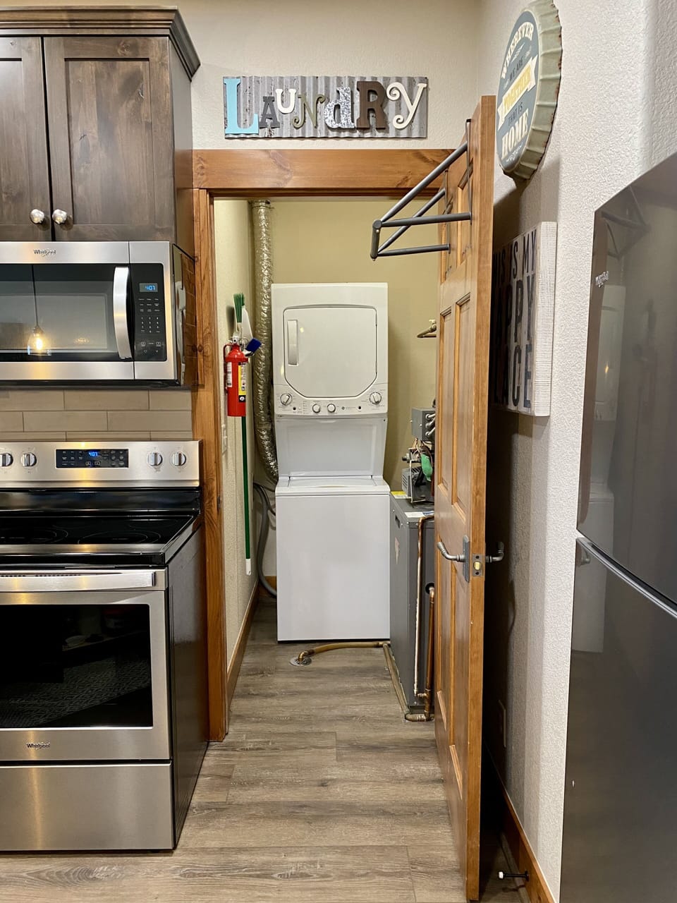 New washer and dryer located off the kitchen. 