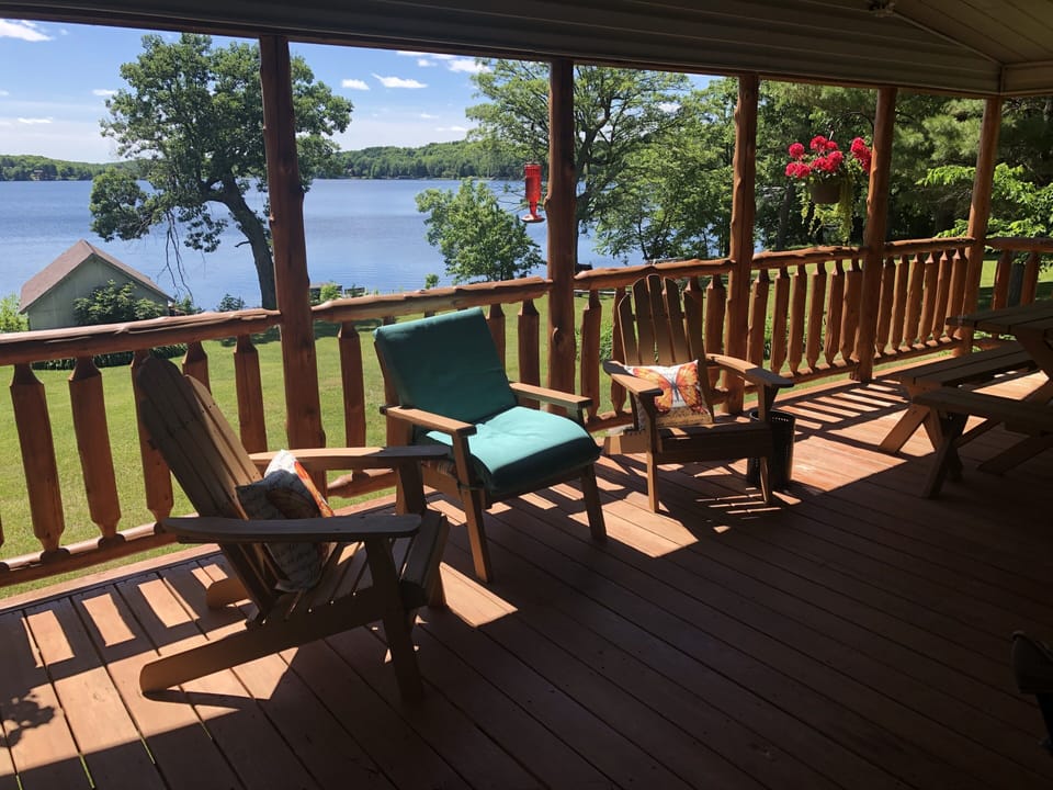 Front porch with elevated views of Big Pine Lake