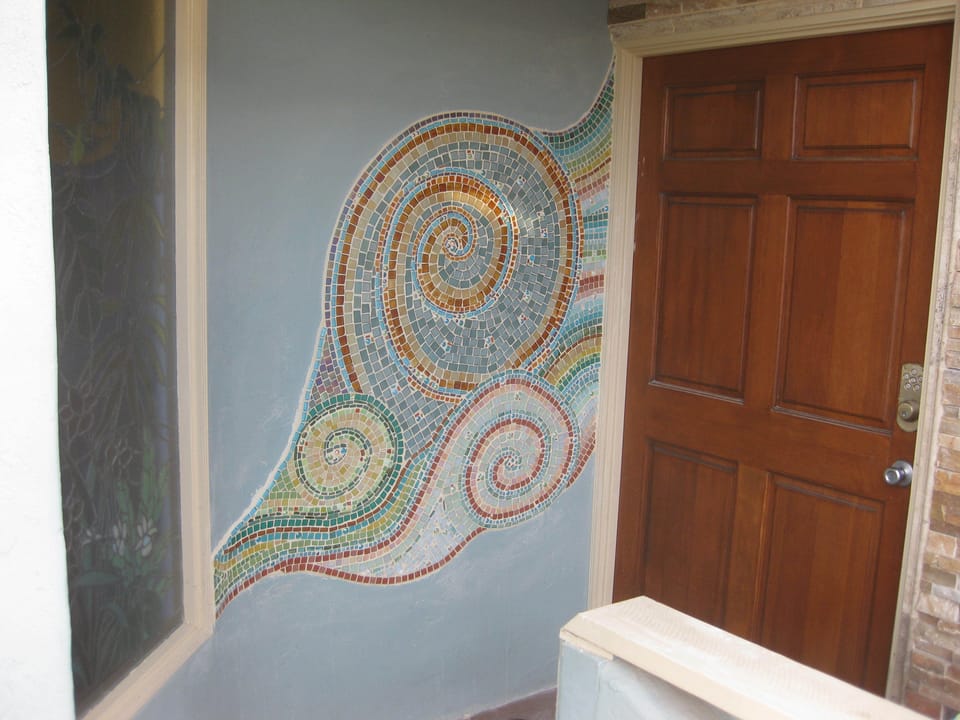 Custom mosaic at entry