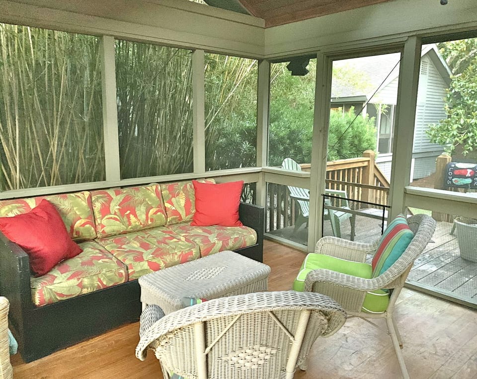 Screened Porch opening to front and back decks