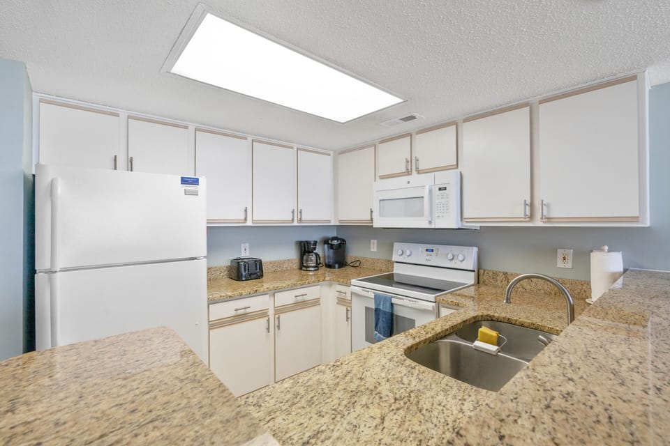 Updated kitchen will granite, full size appliances, Keurig, and dishwasher