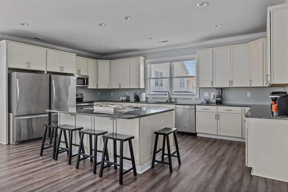 Kitchen Level - Two fridges and expansive shelves/granite countertops for the family to enjoy large gatherings. 