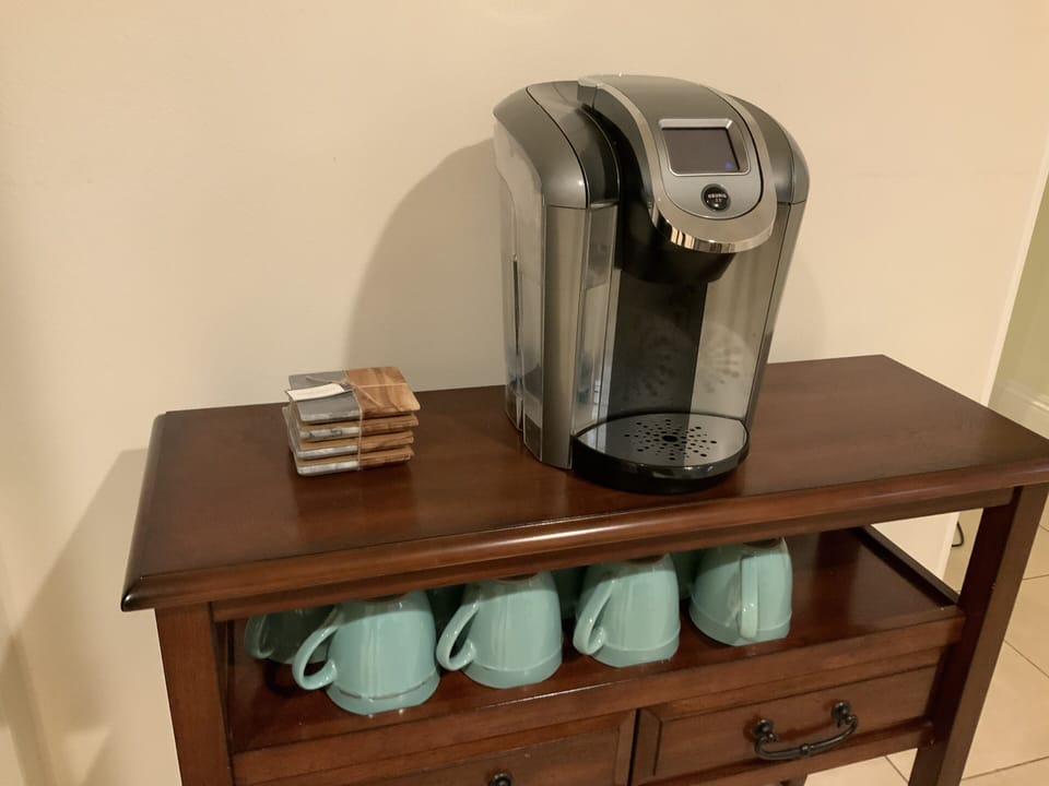 Keurig machine is located between kitchen and dining room. Enjoy!!!