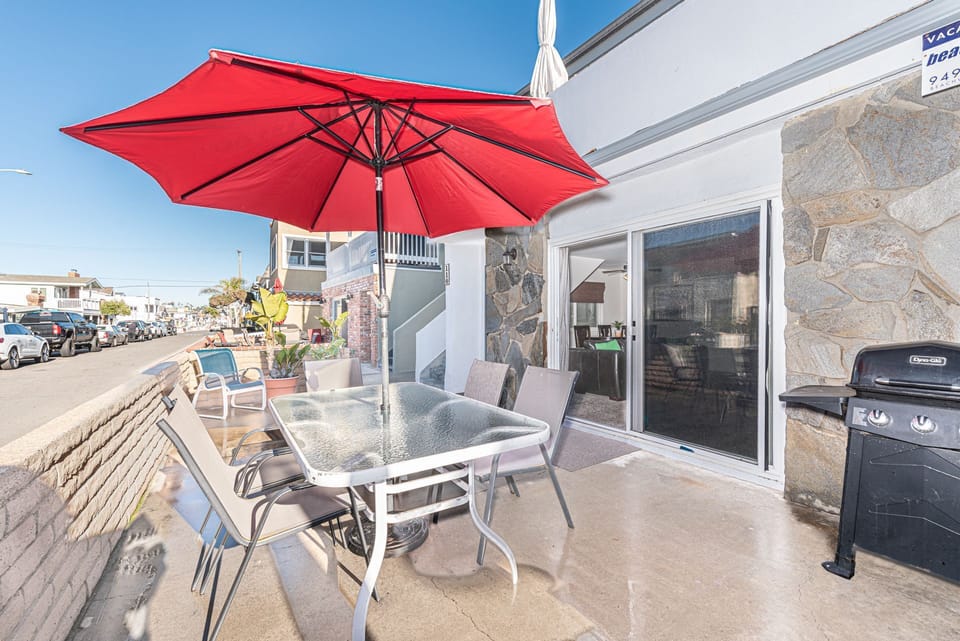 Ocean view from the front patio, 3 houses back from the 35th Street beachfront and boardwalk; includes outdoor dining, propane bbq grill, market umbrella.
                