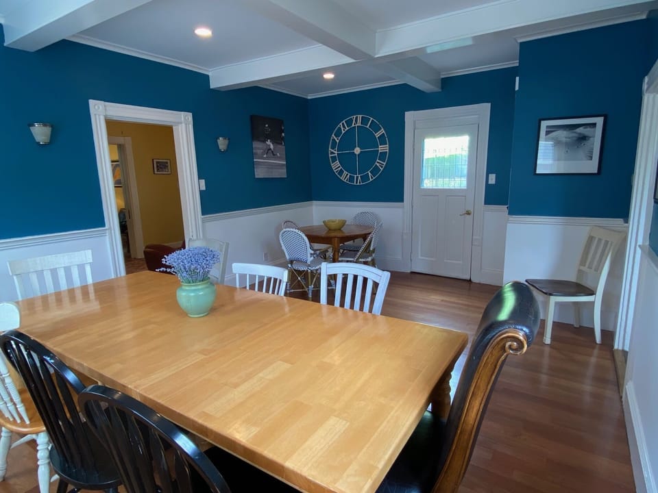 One large farmer's table and on smaller round table for gatherings.