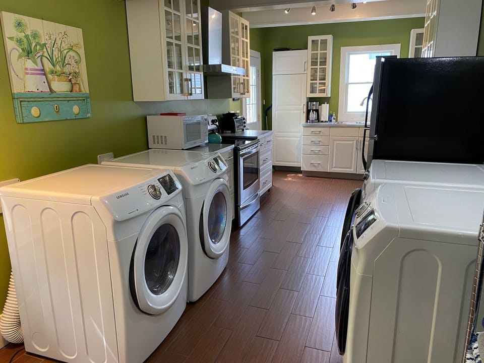 Two sets of high efficiency washer/dryer.