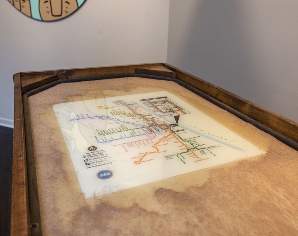Shuffle board with a CTA map for your reference around Chicago