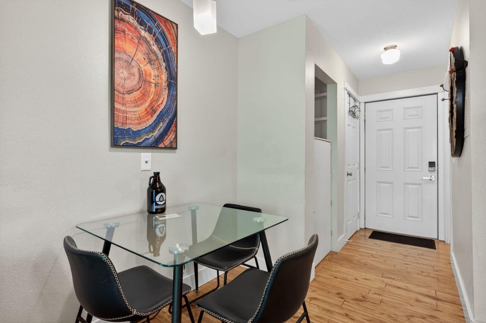Dining for up to 4 in this sweet dining area. The 4th chair is at the desk in the king bedroom