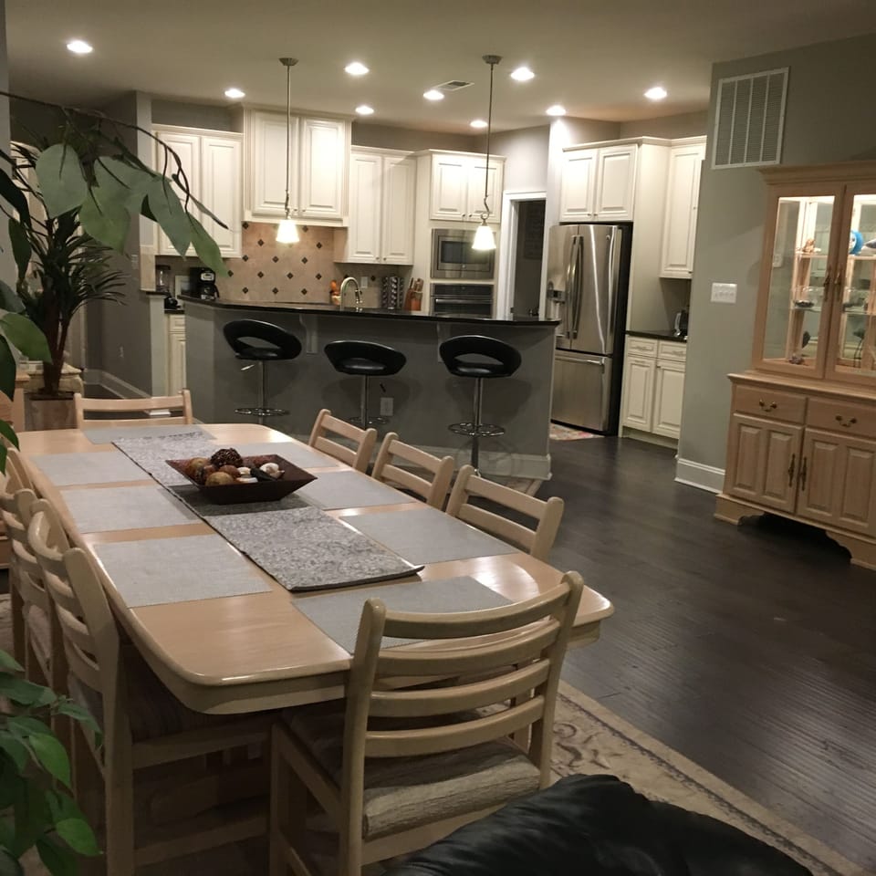 View from Great Room showing dining table and kitchen.