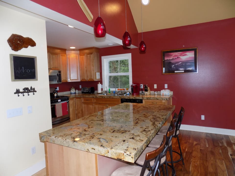 Open kitchen with granite counters