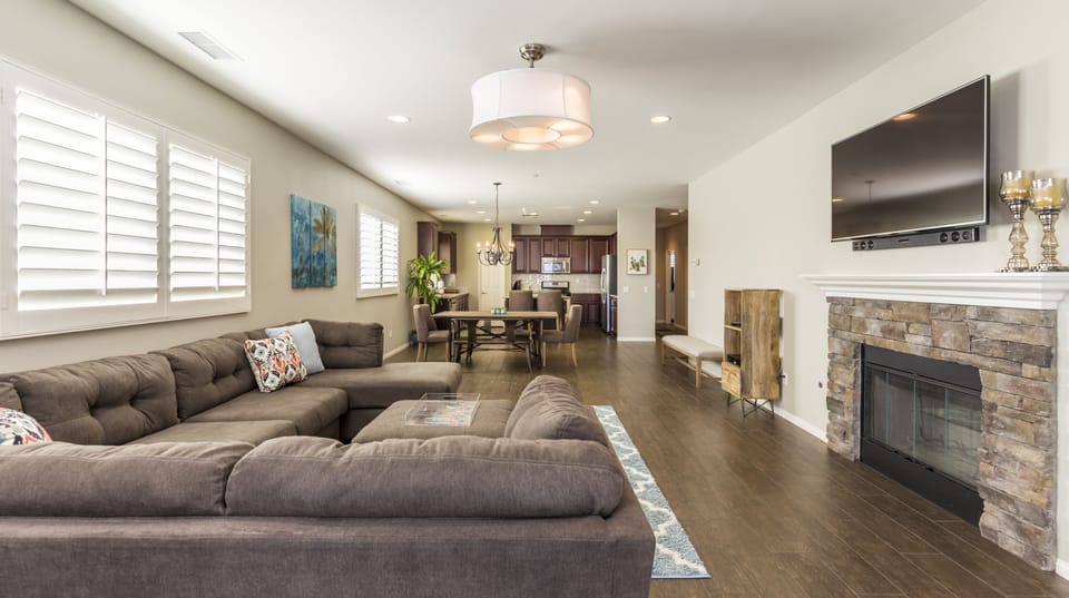 Open living room: 55” smart TV (premium cable, Netflix & Disney+)