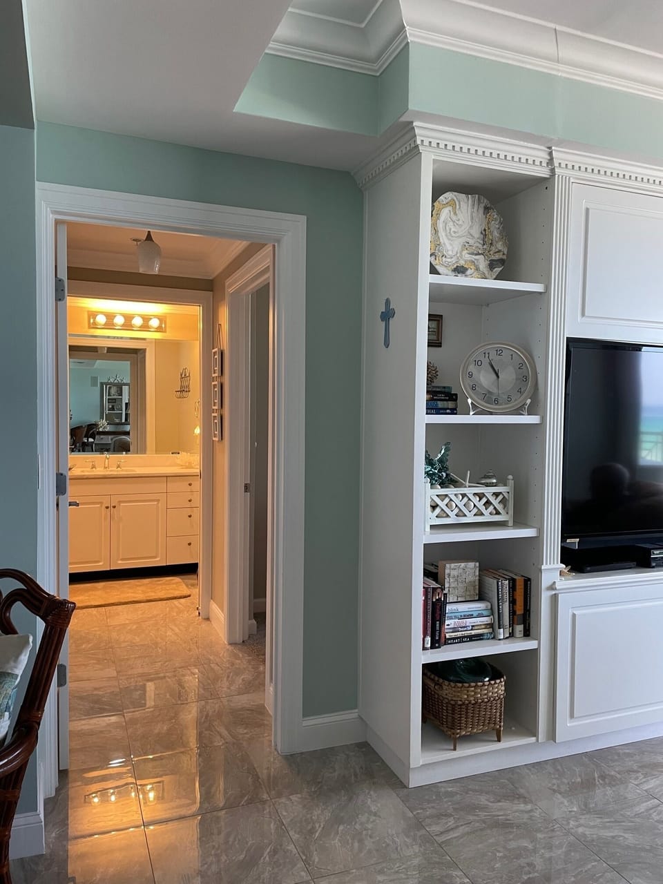 Guest bath doubles as a powder room.  Private access from both Guest BR & LR.