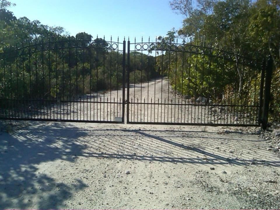 Ultra private gated 7 acre oceanfront estate on Sandy Point. Luxury and Nature!
