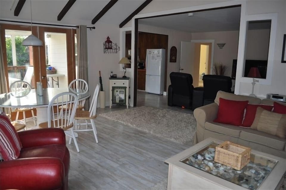 Living room, looking toward TV room and kitchen