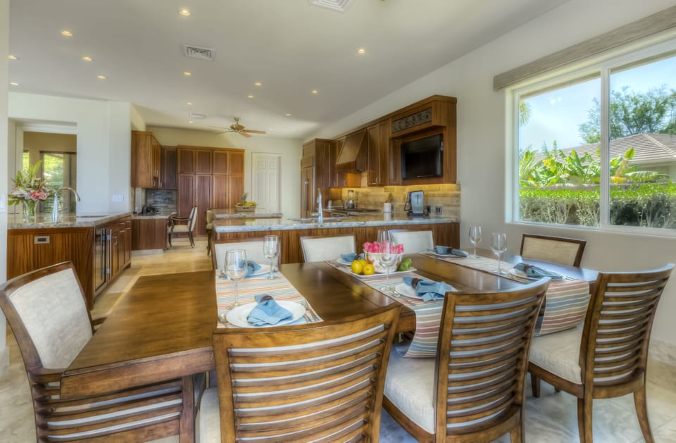 Dining area seats eight comfortably. Ocean view from three sides of the table.