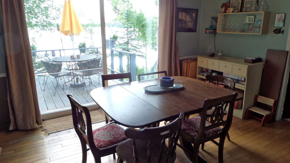 Dining room has 8' patio door overlooking lake.  