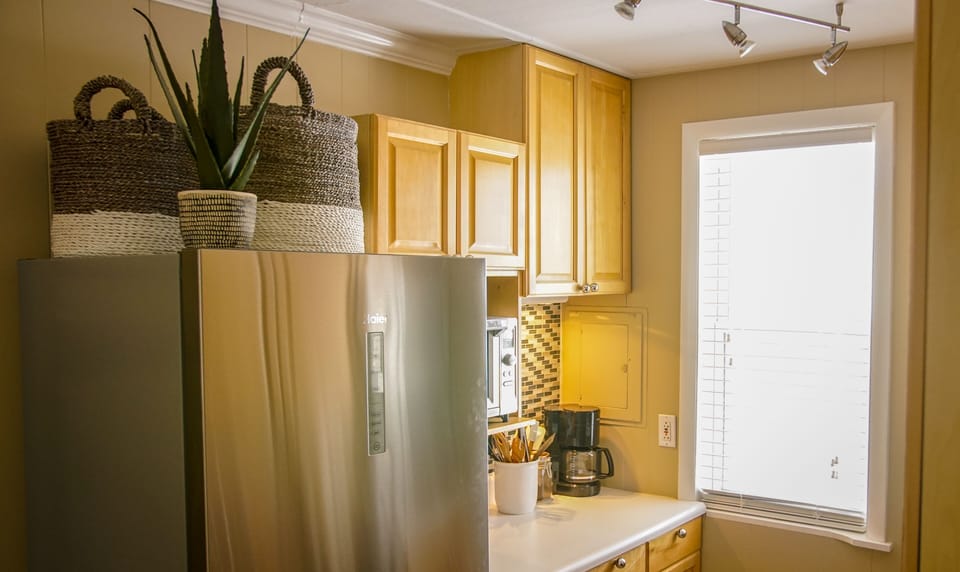 New fridge and glass tile backsplash