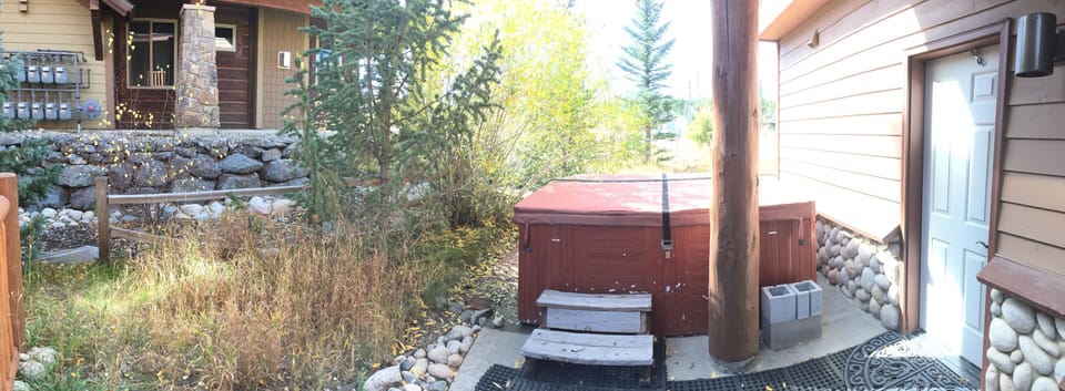 Indulge in the private hot tub on the back porch