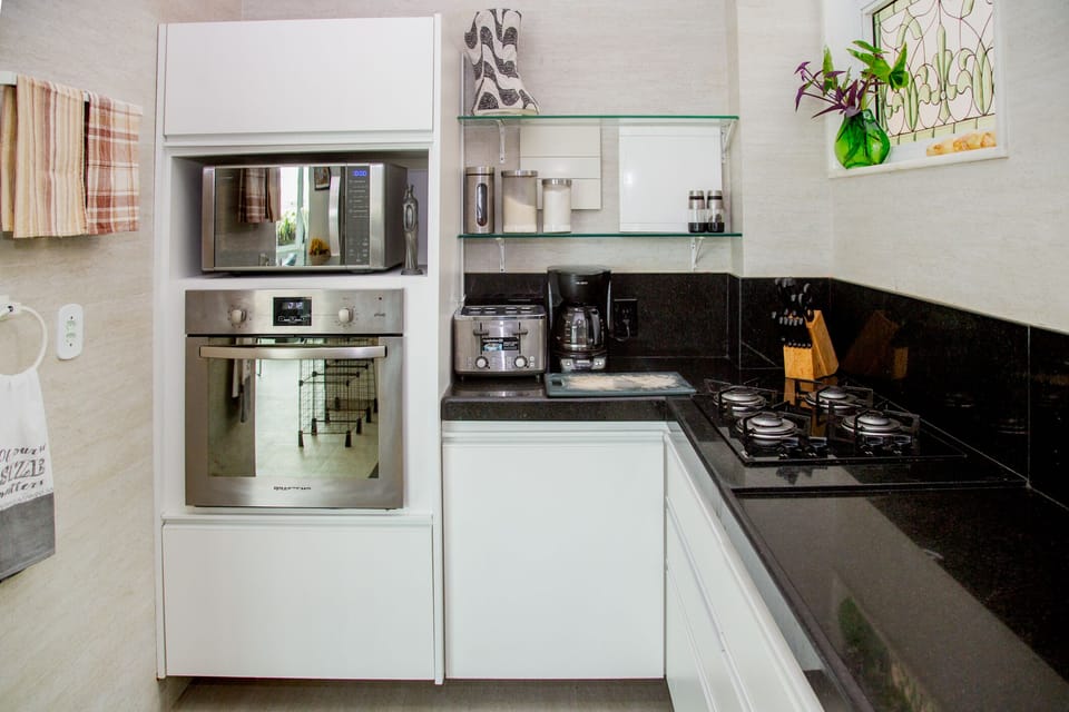 Kitchen area.....everything needed to cook. 
 Calphalon cookware w/ glass lids.
