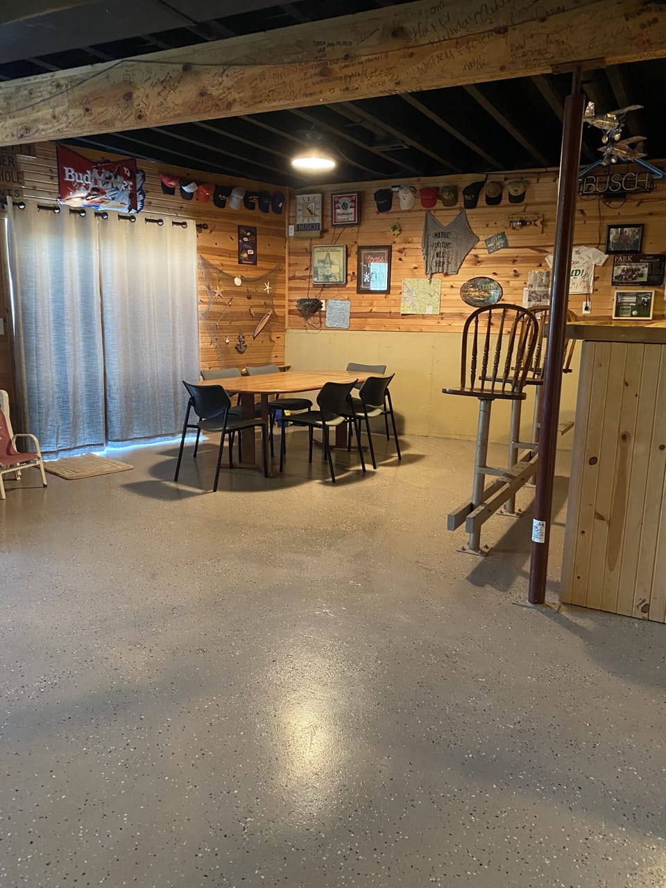Basement area siding glass door leading to lower patio