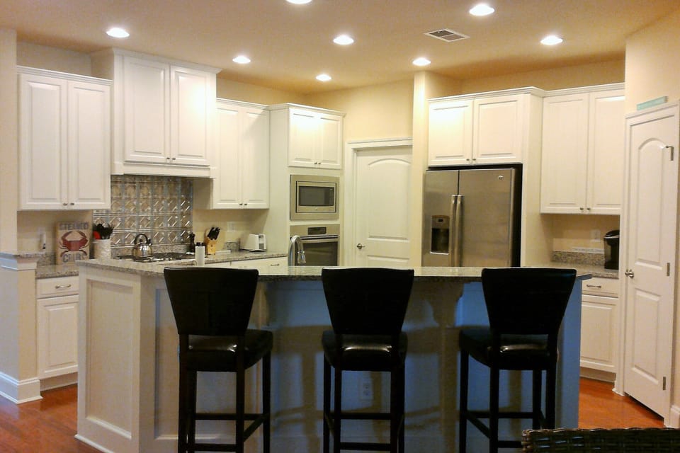 Gourmet kitchen with granite counter tops and gas cook top